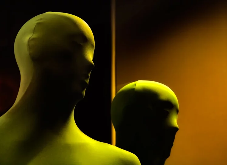 pairs of mannequins photographed in cold light, 